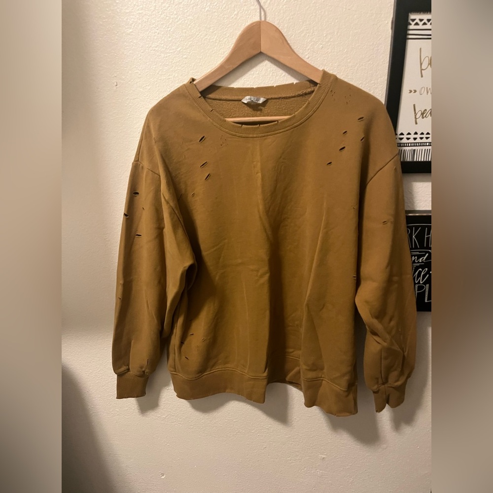 Large distressed sweater
